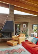 Living Room, Wood Burning Fireplace, Recliner, and Chair Hilton’s rounded-form Balzac collection, which debuted in the early 1990s, continues to be a bestseller.  Search “victor-armchair.html” from Quirky 1970s House in the English Countryside Showcases an Amazing Modern Furniture Collection