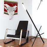 The Axis Floor Lamp from Castor is at once a work of sculpture and a functional light source. Made of precisely machined and anodized aluminum, the light features three poles that intertwine to create a stable structure. The light source, within the main column, is able to rotate 180 degrees, making it easy to adjust light where needed. The other two rods can slide freely through the main column, which adjusts the angle of the light source. The sculptural floor lamp is an undeniable statement-maker, and can be used in a variety of spaces, from minimalist living rooms to industrial offices.