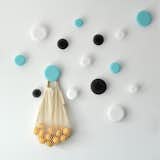 San Francisco–based designer Tina Frey creates modern resin products for the home, using a thoroughly executed design, hand sculpting, and hand casting process. Her bold and playful wall hooks make a graphic addition to an interior. Made from shatterproof resin, each set of three wall hooks includes a small, medium, and large knob.
