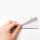 Poketo’s Stick-Up Weekly Calendar is both a sticky pad and calendar, in one slim pad. The pad includes seven sections, each for a day of the week and each section includes lines for writing as well as small boxes for checking off completed tasks.