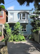 Reigo & Bauer were tasked with updating a modest home in rough shape: the bricks were falling off the facade, and a tiny 9-foot front yard didn't provide enough distance from turning cars in the crowded dead end. For background, Virtue Street is a half-block-long, hook shaped lane lined with 19th century houses, garages, and former workshop in Toronto's West End.