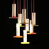 The Cielo Lamp from Pablo is defined by its use of simple, circular shapes. The lamp is comprised of a cylinder that yields to a flat circular LED panel. The Spanish word for “heaven” and “sky,” Cielo is a pendant lamp, and can be hung from a variety of ceilings, whether the light is used in an entryway or to illuminate a dining room table. This light balances color with a white stem—helping to balance the boldness of the color.

Also available in black.  Photo 1 of 7 in Shining Pendants to Brighten Your Home This Winter by Luke Hopping from Modern Pendant Lights with Pops of Color
