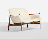 NV-53 settee designed by Finn Juhl (and fabricated by cabinetmaker Niels Vodder in Copenhagen), 1953. Teak, upholstery, brass; estimate $5,000–$7,000.