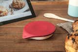 The silicone rubber surface on the top can withstand the heat from a pot of boiling water, and the battery lasts a year between replacement.  Search “kitchensinks--drop-in” from Drop Kitchen Scale and Baking Assistant