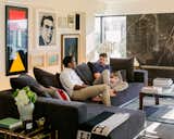 Byron Peart and partner Stefan Weisgerber lounge in their art-filled living room.  Photo 7 of 8 in Photographer Q&A: Alexi Hobbs