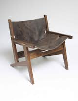 Part of the appeal of the Peninsula chair is that the sling is attached using just brass rods. Should you even want to change the sling, merely slide them out and do so.