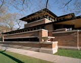 Robie House, Chicago, Illinois (1910)"Early in life I had to choose between honest arrogance and hypocritical humility. I chose honest arrogance." It should come as no surprise who uttered those words—the architect of the famed Robie House, Frank Lloyd Wright. The residence, with its tight recessed entry leading to dramatic light-filled openness, seamless space unencumbered by needless partitions, continuous bands of windows, its horizontal, low-slung form, and overhanging eaves, is what the architect called "a cornerstone of American architecture."