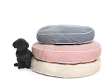 The Engineer Stripe Circle Bed (from $98) is made in the USA, available in three striped color options, and filled with cotton batting. It's machine washable and can be monogrammed.  Photo 1 of 6 in Modern Pet Gear from Waggo by Jaime Gillin