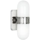 The Rio wall sconce by Jonathan Adler showcases classic mod style, accented with a curved form and glass shade, $195.