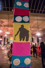 Yarn Bombing Los Angeles created the Yarn-o-polis installation at the historic Grand Central Market food hall in downtown Los Angeles, in collaboration with over 80 knitters and crocheters.