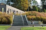 Making use of a sculpted berm, Tod Williams Billie Tsien Architects built identical 21,500-square-foot dormitory buildings at Haverford College without interior stairwells or elevators, freeing up room for courtyards and more generously sized common spaces.