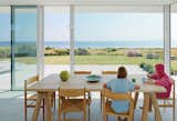 Oskar and Karl, 12 and 9, share breakfast at their family’s summer getaway in Sweden. The table is from ILVA, and the CH36 chairs by Hans Wegner are from Carl Hansen & Søn.