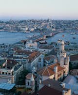 The view from the Galata Tower in Istanbul, Turkey overlooks the Galata bridge and an assortment of rooftops which are nestled along the edge of the Beyoglu district. Photo by: Cristóbal Palma
