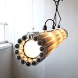 Made from recycled fluorescent bulbs, steel, rubber and hardware, the Recycled Tube Light measures 8” x 69” and is a great example of creative upcycling. Photo courtesy of Matter.  Search “ceasarstone-recycled.html” from Recycled Tube Light by Castor