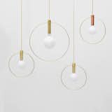 Aura LightsA pared down pendant lamp that comes in a brass or copper base and a 10-or 15-inch brass ring. From $345