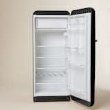 Each refrigerator is made in Italy and features glass shelves, with a bottle rack, produce drawer, two egg shelves in the door, and an icebox. (Perfect for storing the best ice cube tray).