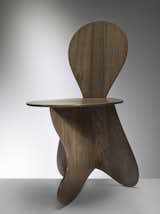 The Fume chair was inspired by "simple church and peasants' furniture." The chair contains just enough elements to function as a seat, and no more.