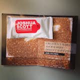 Sending a little something extra along with the classic postcard promo always catches our eye. Joshua Scott had the right idea with lens cleaning wipes, a useful tool for any photo editor.