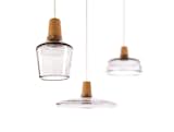Made from hand-blown glass and wood, the Industrial Pendant Lamp from Kaschkasch Cologne for DWR, can hang alone or as a trio.
