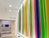 A wall of colored Krion sample sheets.
