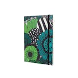 This Marimekko Notebook is defined by its bold floral pattern. Named Siirtolapuutarha—the Finnish word for allotment—the print is inspired by the community gardens allotted to city dwellers in Helsinki. This notebook contains 96 ruled pages, an interior pocket for stowing loose papers, and an elastic band to keep the notebook secure.