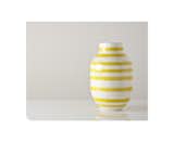 Large Yellow and White Omaggio Vase 19th-century Danish ceramic company Kahler combines sunny colors and graphic shapes to create this simple, summery vase. $98
