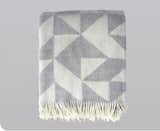 Twist a Twill BlanketMade in Denmark from 100-percent new wool, Tina Ratzer’s twill patterns are great lightweight throws to have around the house, we particularly love the light gray color way. $139