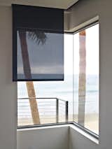 Without some type of shading device, traditional windows—especially those that look out onto reflective surfaces like bodies of water or mountains covered with snow—can create glare on the interior of a room.