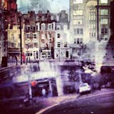 What is a double exposure, and how does it differ from a normal everyday picture?
A double exposure is a photographic technique that was likely accidentally invented when some analogue photographer forgot to wind his film to the next frame and took two images over the same part of the film strip. The result is a composite image of two (or more) superimposed photographs. The same effect is easily achieved with digital images in post-production, or, in this case, with an iPhone and a simple editing app.
What was the inspiration behind your New York + London Double Exposure project? What were you trying to express about both places?
I think New York and London are two of the most beautiful urban spaces in the world. In my last month living in NYC, I really found myself looking at the city differently through a haze of nostalgia and realized I needed to pay homage to my 7 years living there. I stockpiled iPhone photos during those last few weeks, while on assignment or while frantically running around packing and tying up loose ends. When I got to London, I knew that I wanted to capture not just the sensation of leaving NYC, but also of exploring a new city and making that environment feel like home.