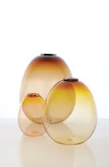 Egg Vases by Orbix Hot Glass  $630 per set of three Each Egg vase is handblown by Cal and Christy Breed in their Alabama studio. orbixhotglass.com  Search “egg” from Made in America: 8 Great Products from the South