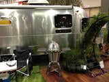 Best grilling environment: Caliber ThermaShell Pro Stainless Steel charcoal grill in front of Airstream's new LandYacht.