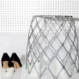 This sturdy stool is inspired by the delicate filigree of the Staghorn Cholla cactus. Designed by the architect and co-founder of Artecnica Enrico Bressan, the Kaktus Stool is a contradiction in form—lightweight aluminum gives the appearance of airiness and fragility, but is entirely weight-bearing. The Kaktus stool is made from 100% recycled aluminum and can be used as a seat or side table. When not in use, the stool appears sculptural and makes an artful accent in an interior space.  Photo 2 of 8 in Sustainable Products in Honor of Earth Day by Marianne Colahan