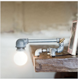 Adding a light bulb to an old piece of piping might seem strange, but the elegant result of the Kozo 21 lamp speaks for itself.  Photo 4 of 6 in Amazing Repurposed Designs by Emma Marsano