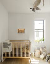 Schmidt selected Oeuf’s Robin crib for Finn’s soon-to-be sibling. The bird mobile is by Tamar Mogendorff.