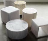 Various marble (and one wooden!) round and cube stools elegantly occupy the floor. Use it add a sculptural piece or as small tables.