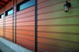 The colors contained within the range are primarily natural, complementing the home's rural backdrop. “Initially I was a little skeptical,” says Kamer, “but then the more we looked at it, I really liked the way the colors reflected in the sun, and we liked that it was a bold move.”