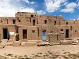 Taos Pueblo in Taos, New Mexico, has been the home of a Native American community for over 700 years. Built from adobe —a durable mixture of earth, water, and straw — the houses pictured here are still home to about 150 Pueblo Indians today. Photo via National Geographic