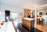 Architects Sara and Jeremy Imhoff and their son Jonah use the renovated kitchen in their 1918 bungalow in Seattle's Fremont neighborhood.