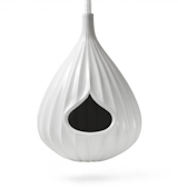 This handthrown white stone birdhouse is "the ultimate modernist pad for your friendly neighborhood birds."