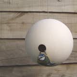 The spherical design of the Birdball encourages small garden birds to nest and find protection from the elements.