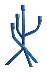 A blue BoConceptcandelabra can function as a conversation piece on any tablespace.