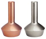 Copper and silver candleholders, $9.95 each from H&M's new home collection.