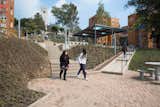 The makeover retained the stair's linear layout for efficient circulation, while creating moments of respite. A series of ramps divert pedestrians from the main path toward gentler, more scenic routes.