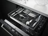 In addition to the standard two levels of storage, the dishwasher has a third rack for odd-shaped items like cooking tools.  Search “letter-rack.html” from New Kitchen Technologies to Watch
