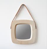 The Raw mirror from Stanley Ruiz combines buttery birch plywood with a masculine leather strap, $175.  Search “raw-mirror.html” from Trend Report: Leather Trimmed Mirrors