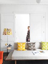Living Room, Sofa, and Dark Hardwood Floor Textile designer Orla Kiely’s renovated London Terrace House is punctuated by her distinctive palette and motifs.  Photo 1 of 5 in A Textile Designer’s Home Is Unapologetically Colorful