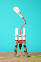 Lighht 002 is made from readily available hardware materials: High-Viz extension cord, plug splitter, clamps, Philips SlimStyle flat LED bulbs, adaptor plugs, all-direction extension adaptor, paracord, and epoxy.