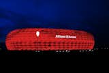 Allianz Arena (Munich, Germany: 2006 World Cup)

Luminous and lofty, Allianz Arena lit up the 2006 competition with its revolutionary façade, a membrane of inflated plastic panels that can change color. Swiss architects Herzog & de Meuron designed the stadium to put spectators as close to the action as possible. 

Photo by Mohamed Yahya, Creative Commons