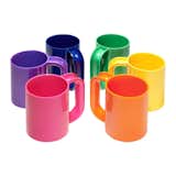The Heller Rainbow Mugs are a colorful addition to an outdoor event. Designed by Massimo and Lella Vignelli for Heller in 1964, these mugs are characterized by clean lines and a simple, classic aesthetic. Crafted in melamine, the pieces are durable and light.