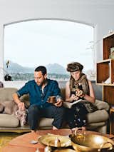 In the living room of their Vancouver home, Omer Arbel and Aileen Bryant sit on a Coronado sofa by Afra and Tobia Scarpa for B&amp;B Italia. They are joined by their Weimaraner, Bowie, boa constrictor, Picasso, and milk snake, Legs."I have a casual approach to prototyping that involves our day-to-day life. I am always tinkering, and I have lots of transformers to run electricity through things, but Aileen lives with me now, so I have to be respectful. Before she moved in it was like a total madhouse; now I can’t pour concrete in the kitchen. It is a collaboration in a sentimental sense. This work is my life, and the objects are my objects, but how they are arranged and the flow of each room are something we’ve created together here."